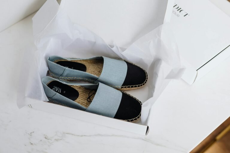 Stylish espadrilles pair in carton box